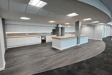 Modern office kitchenette and break area.